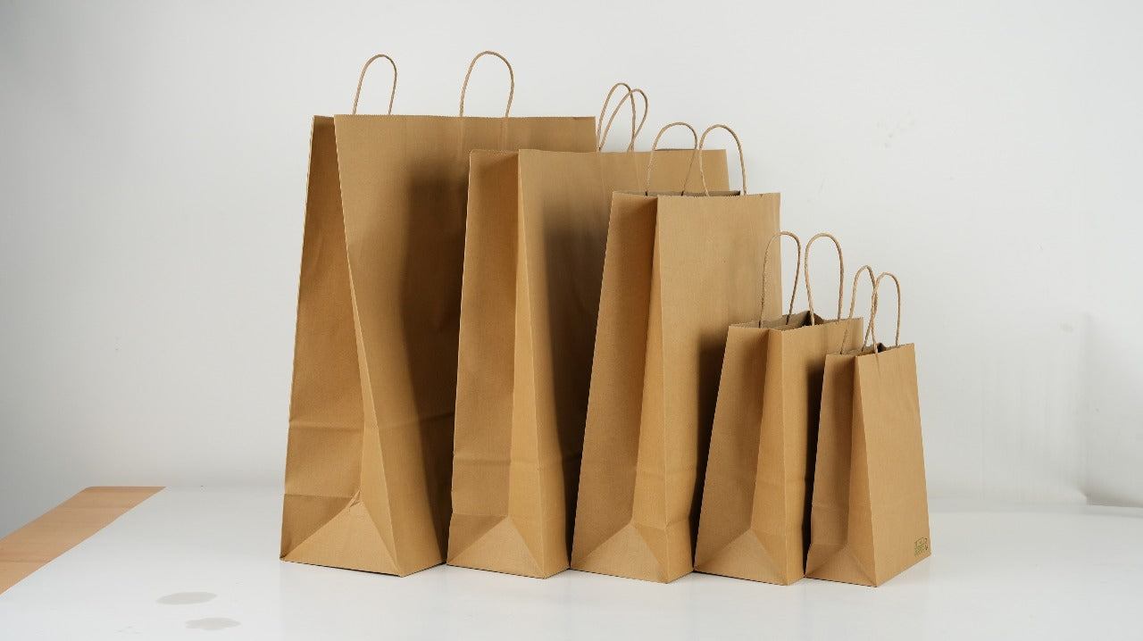 Stevige en duurzame papieren tasjes voor take away en bezorgservice, biologisch afbreekbaar en milieuvriendelijk
