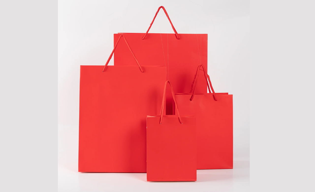 Papieren Koordtassen kopen | Stevige & Stijlvolle Geschenkzakken – Lasentopack