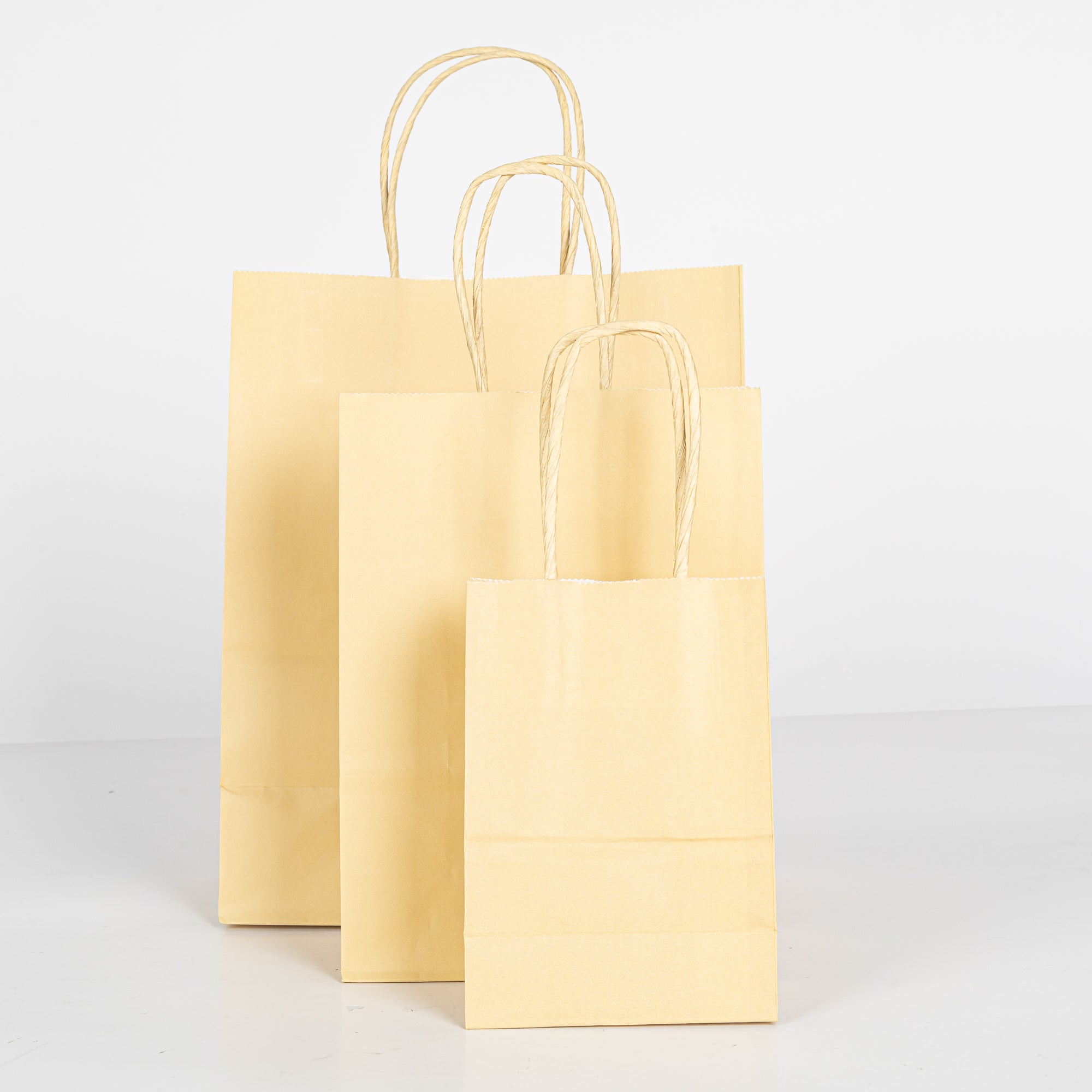 12x Papieren tas gedraaid handvat - 11cm x 15cm x 6cm - Licht Geel