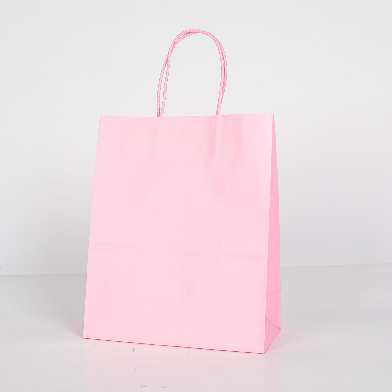 12x Papieren tas gedraaid handvat - 22cm x 27cm x 11cm Licht Roze