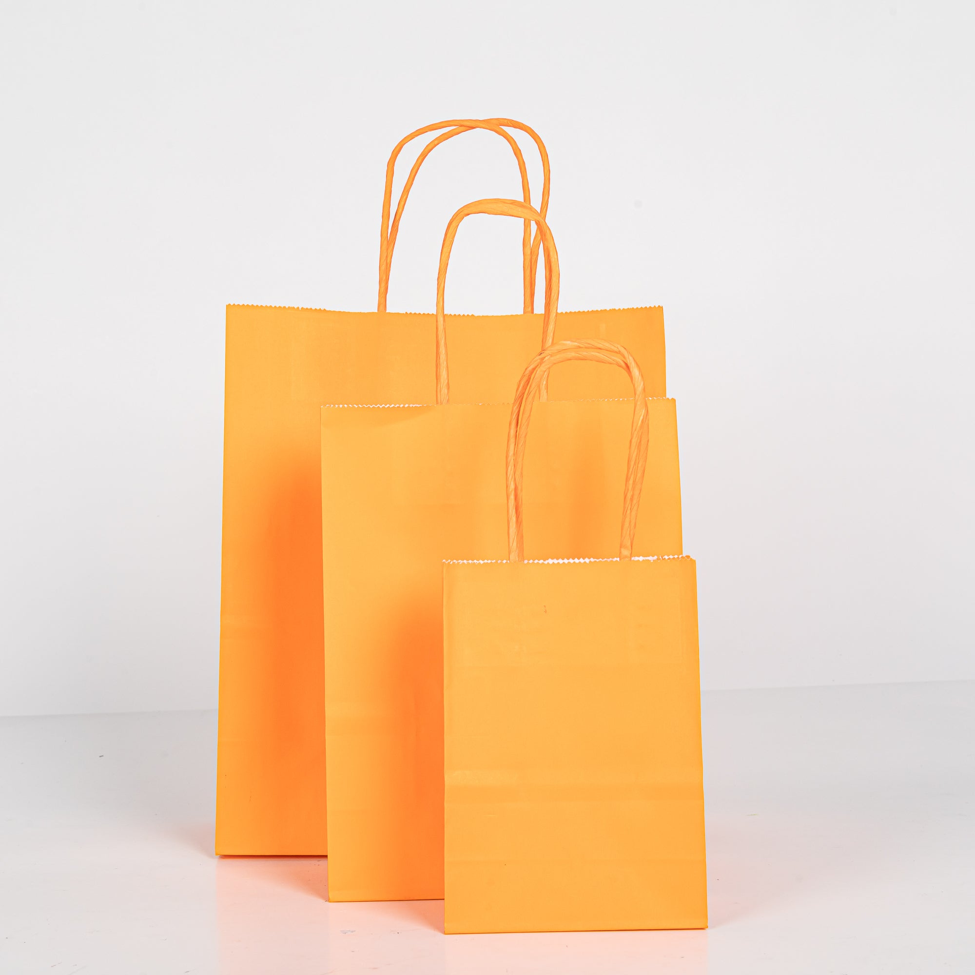 12x Papieren tas gedraaid handvat - 11cm x 15cm x 6cm - Oranje