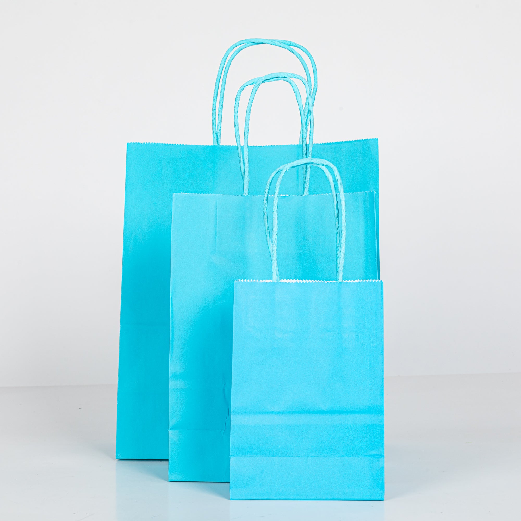 12x Papieren tas gedraaid handvat - 11cm x 15cm x 6cm - Cyan