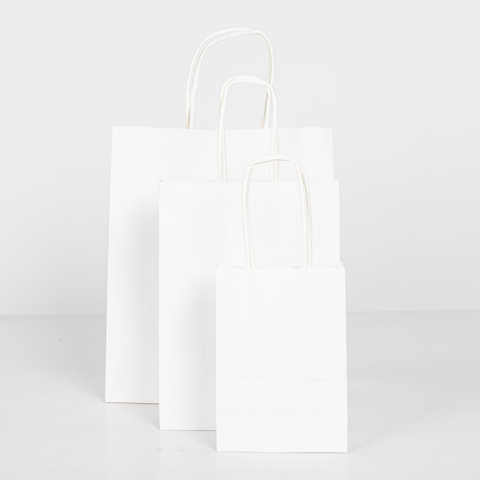 12x Papieren tas gedraaid handvat - 11cm x 15cm x 6cm - Wit