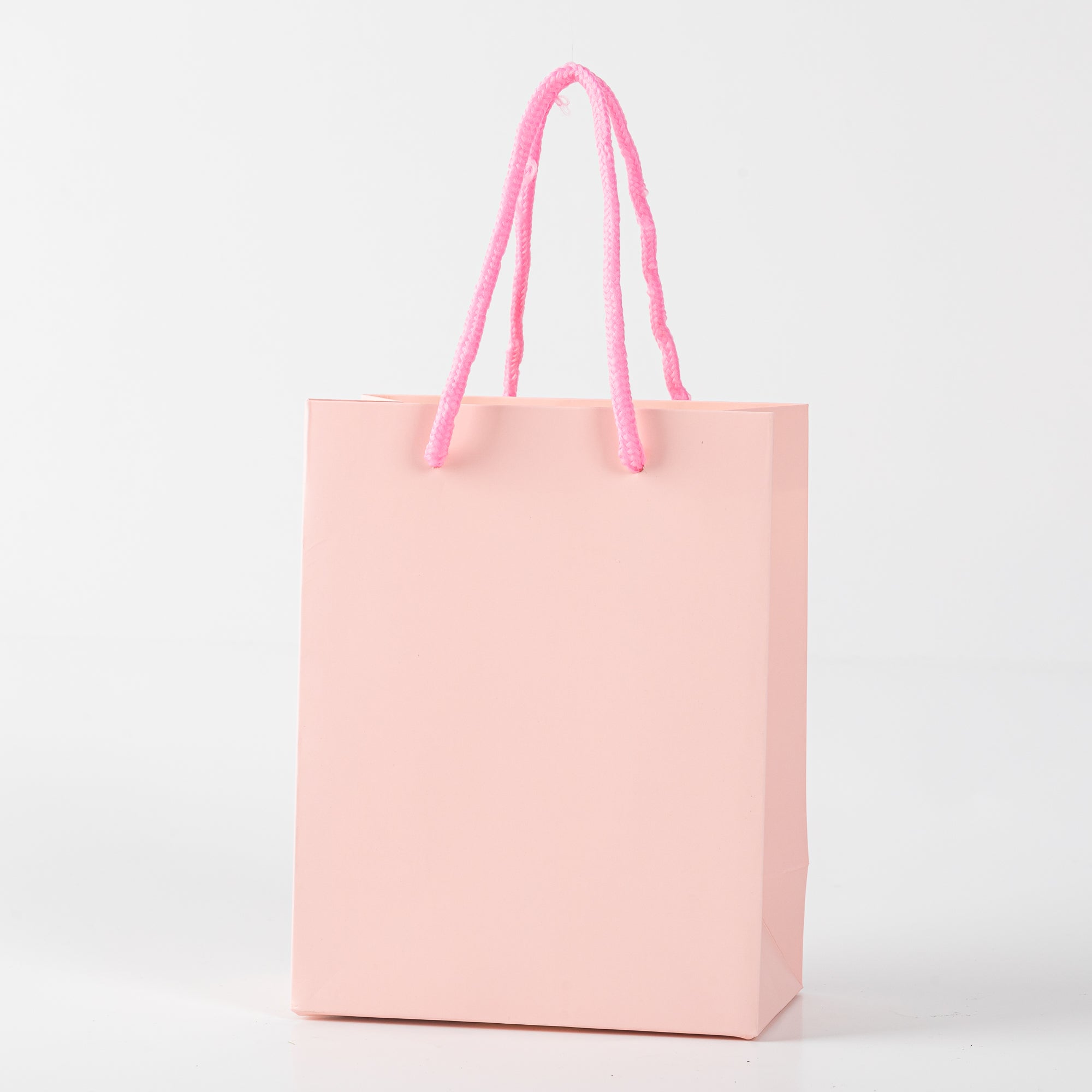 12x Papieren koordtas - 18cm x 14cm x 8cm - Pink