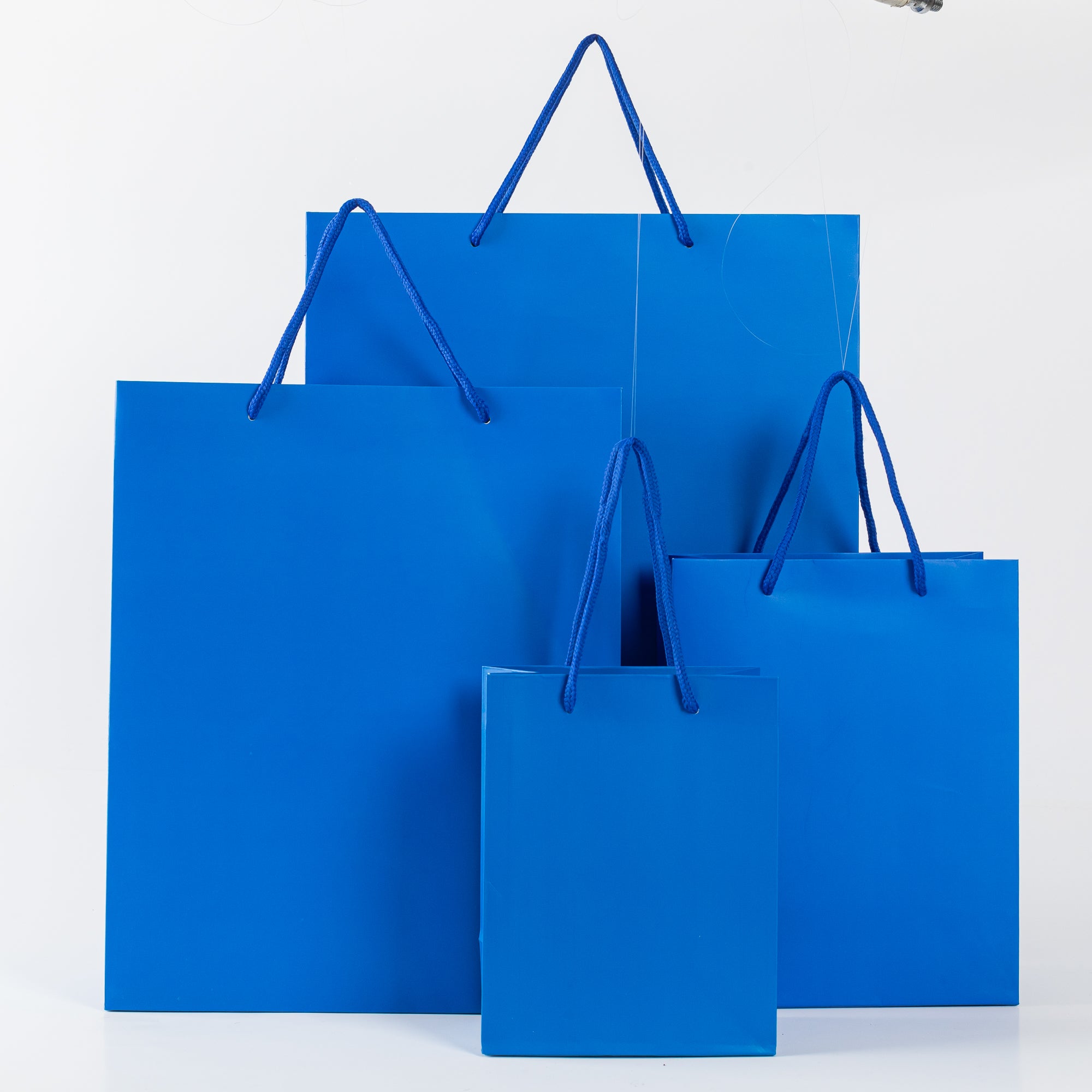 12x Paper drawstring bag - 18cm x 14cm x 8cm - Dark Blue 