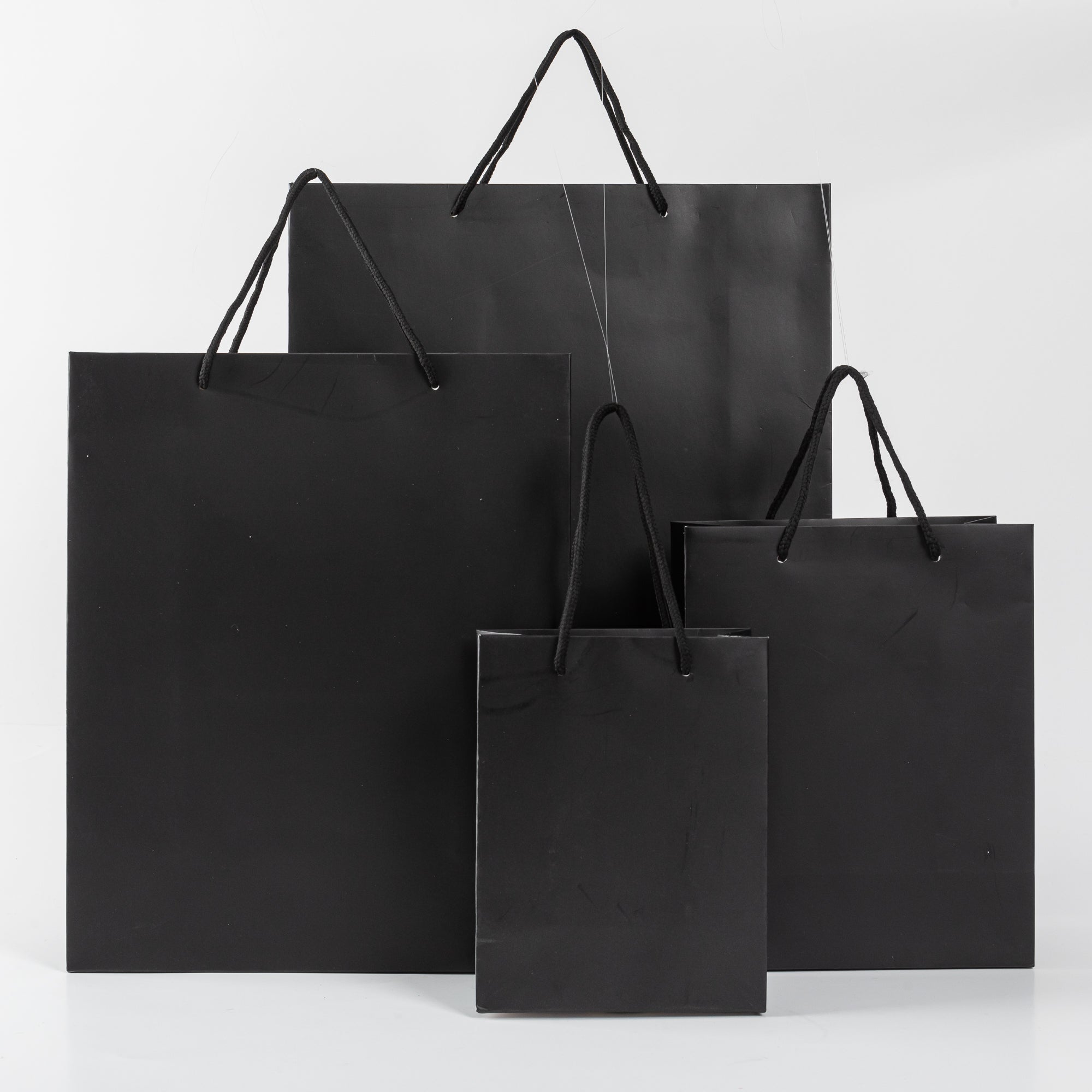 12x Paper Drawstring Bag - 18cm x 14cm x 8cm - Black 