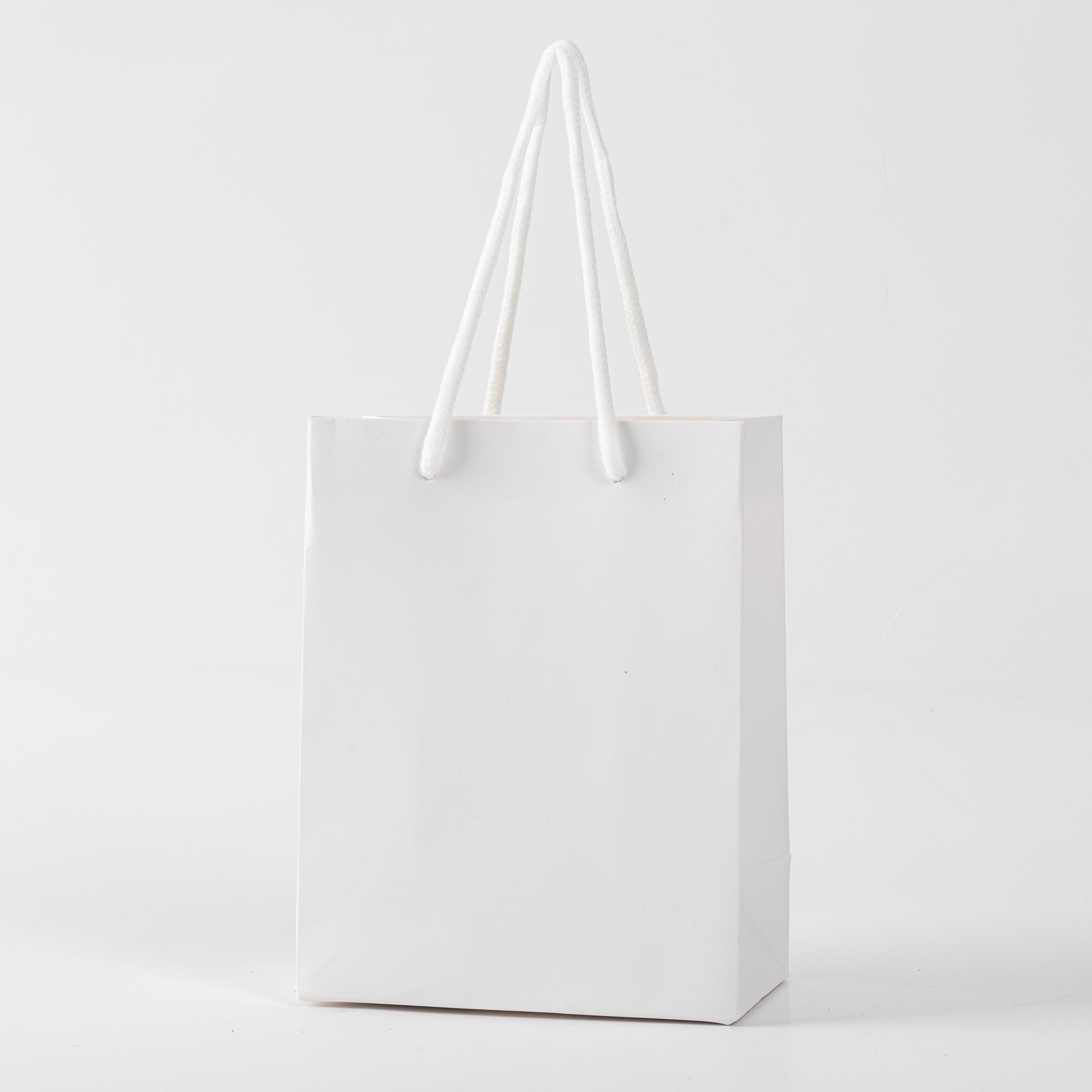 12x Paper drawstring bag - 26cm x 32cm x 12cm - White 