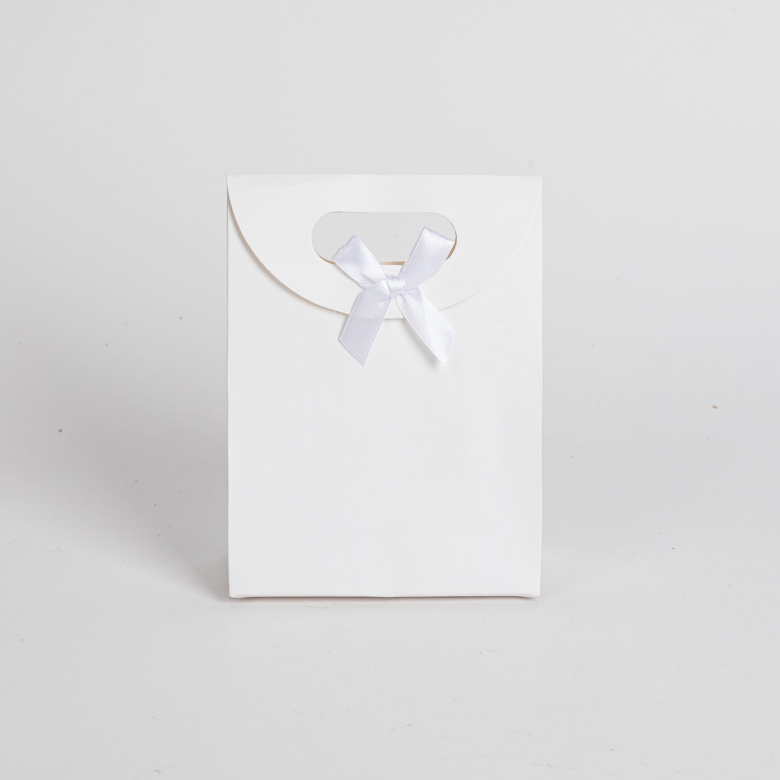 12x Luxury carrier bag with cut-out handle White 31.5cm x 23cm x 11cm 