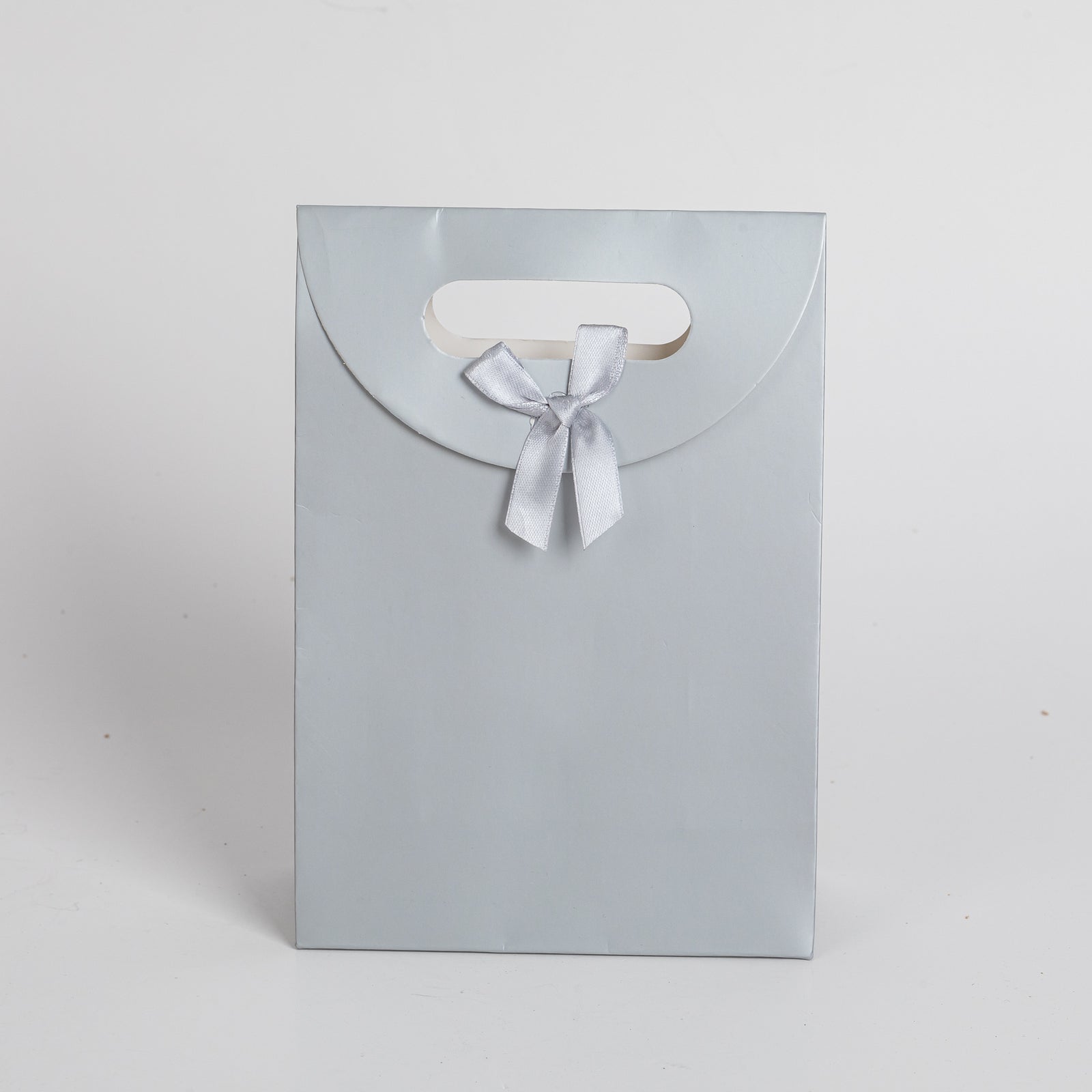 12x Luxury carrier bag with cut-out handle Silver 31.5cm x 23cm x 11cm 