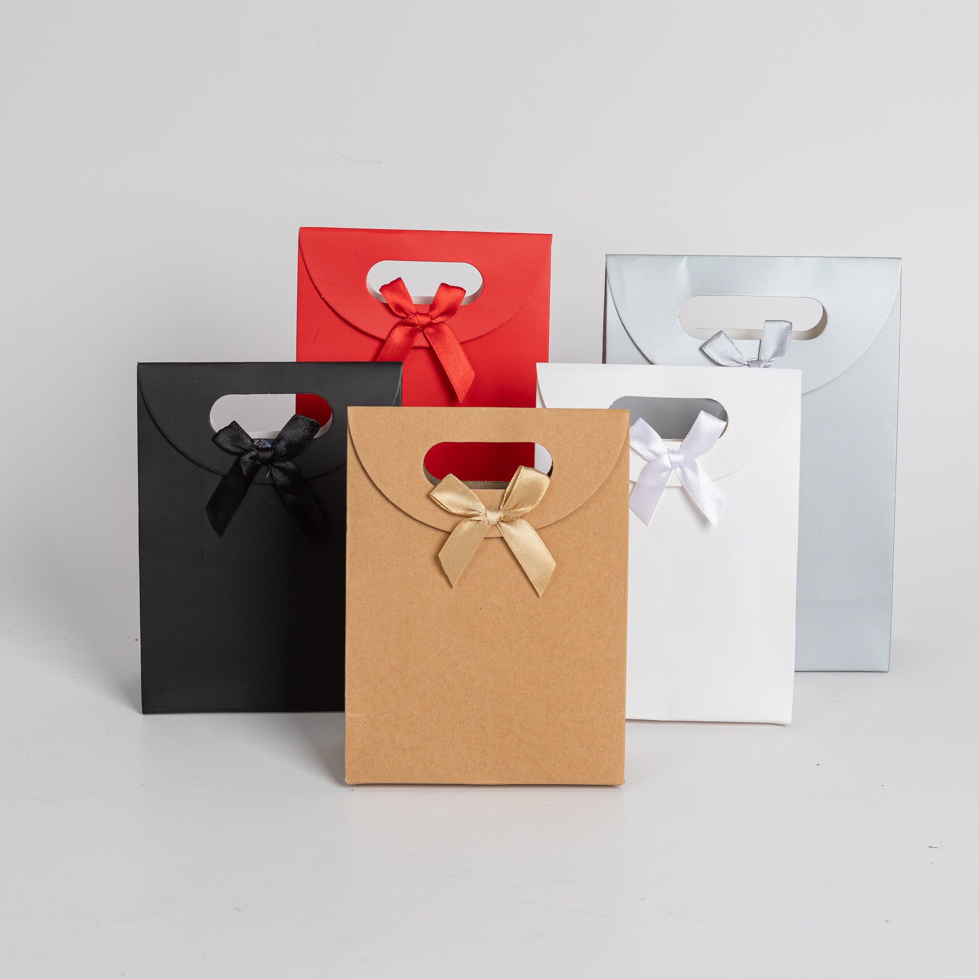 12x Luxe draagtas met uitgesneden handvat Bruin 14cm x 20cm x 7cm